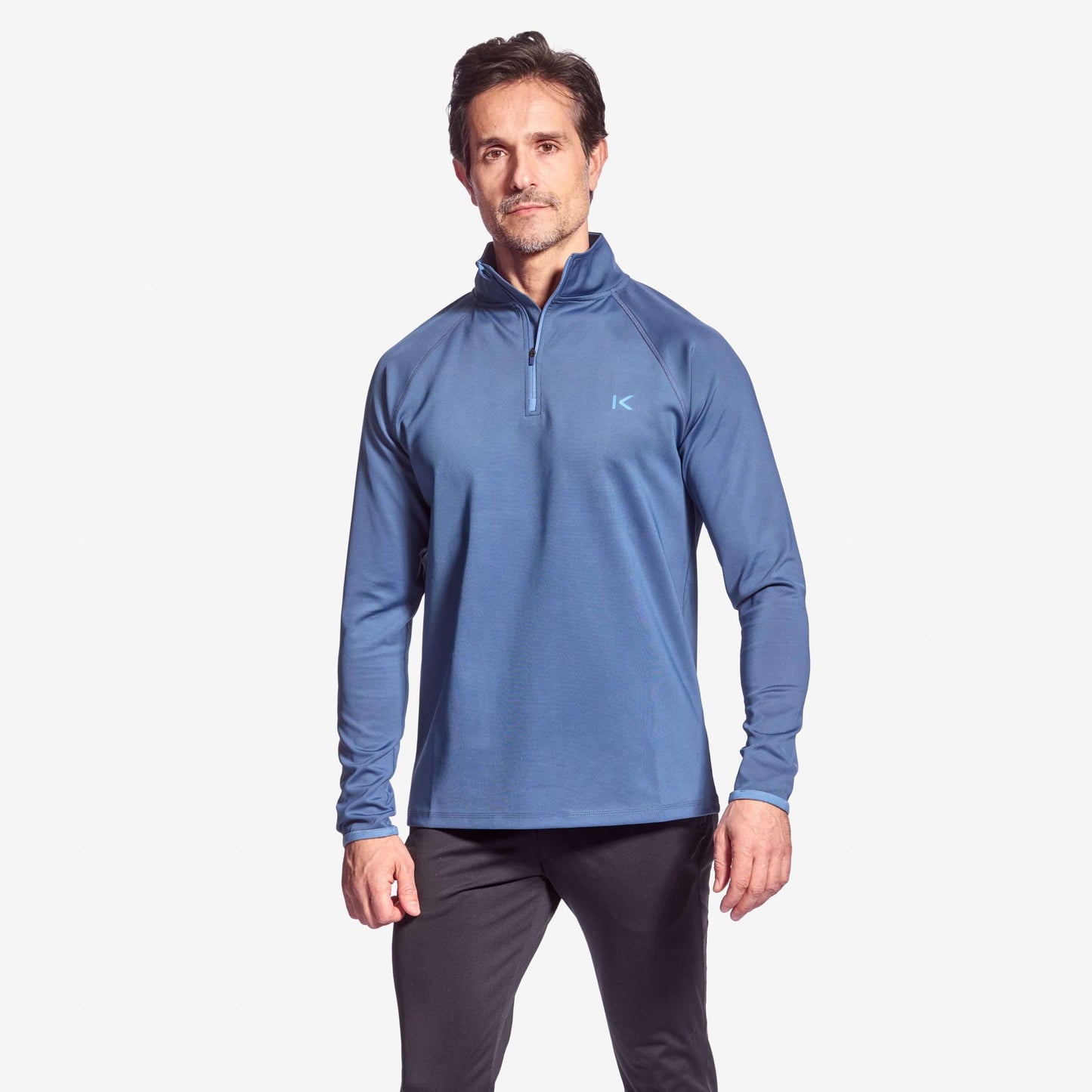 Men’s Kymira Golf Mid ¼ Zip – infrared performance golf mid-layer with Celliant® technology, ergonomic fit, and recovery benefits. Blue
