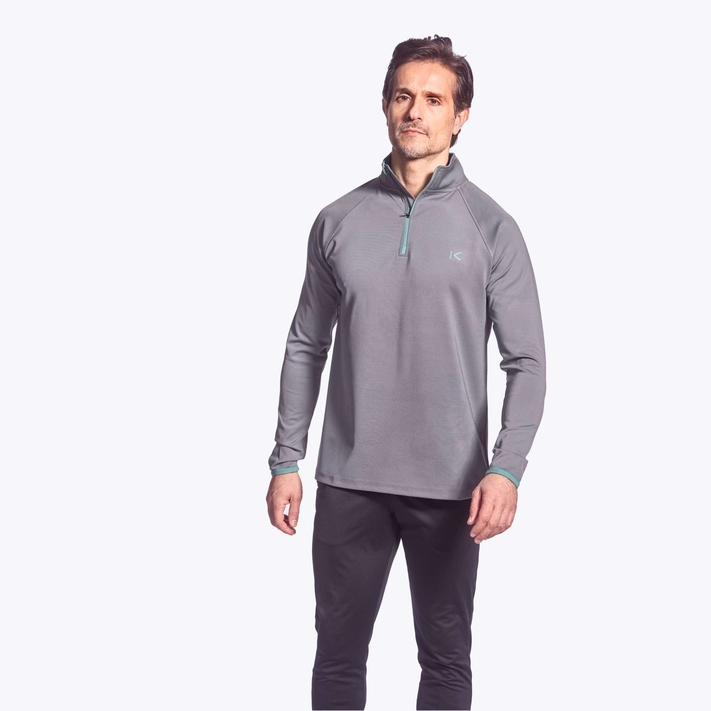 Men’s Kymira Golf Mid ¼ Zip – infrared performance golf mid-layer with Celliant® technology, ergonomic fit, and recovery benefits. Grey